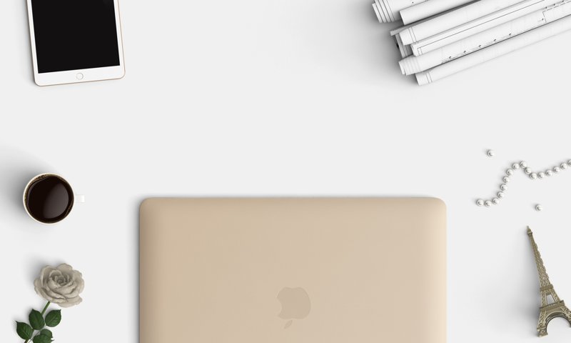 How To Choose A WordPress Theme Header Image Of Golden Mac Laptop Smartphone