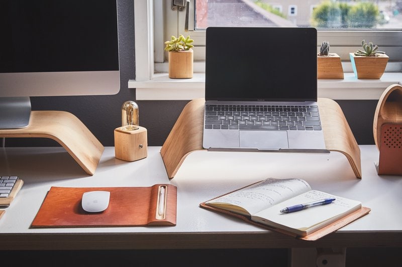 Wordpress Tips Tricks & Hacks Header Image Of Desk With Mac Laptop Notebook & Mouse