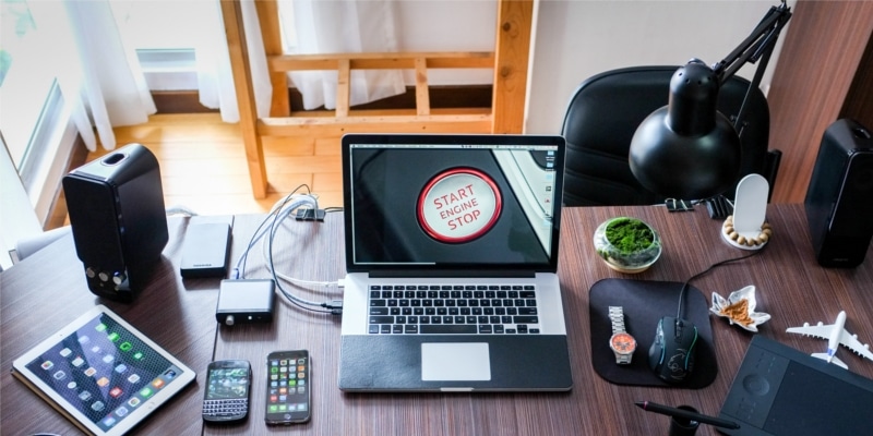 Why Use WordPress Header Image Of Desk With Laptop Tablet Smartphones And Cables