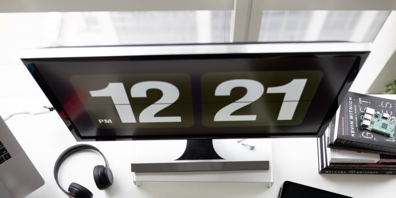 Top View Of Blogging Desktop Computer Screen With Black Bulk Time Display