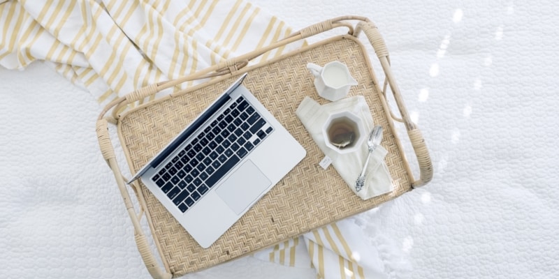 Work From Home Blogging Laptop To Doing Blog Tasks From The Comfort Of Your Bed