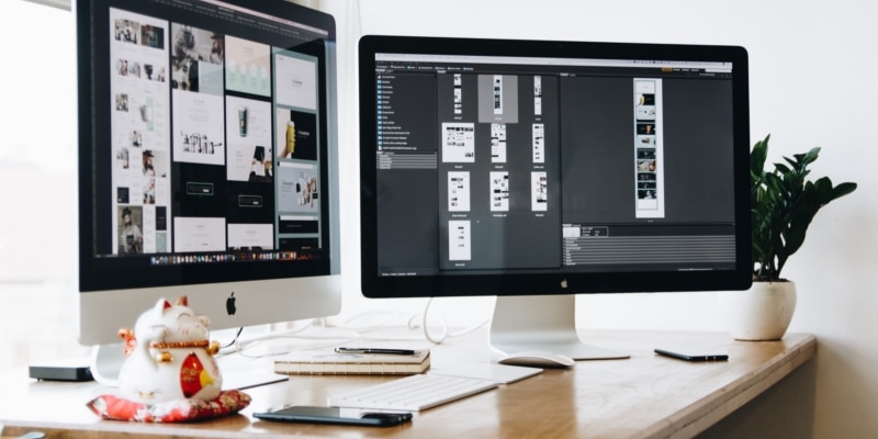 Blogging Entrepreneur Desk With Dual Monitors For Business Work
