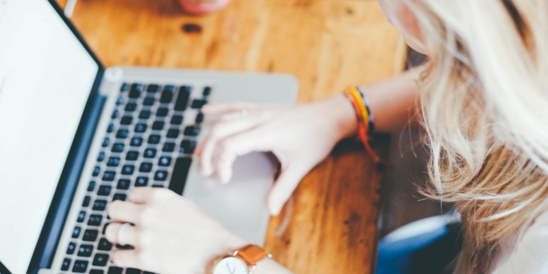Female Blogger Using Laptop To Blog In The Gutenberg Editor
