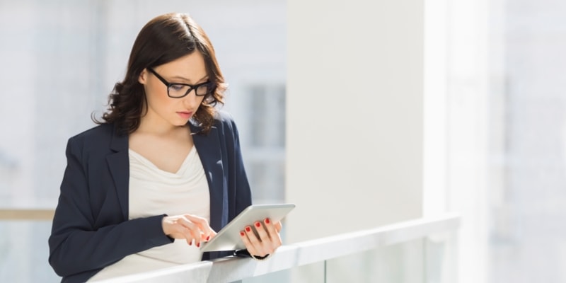 Why Start A Blog The Pros And Cons Of Blogging Header Image Of Female Blogger Using Ipad 1
