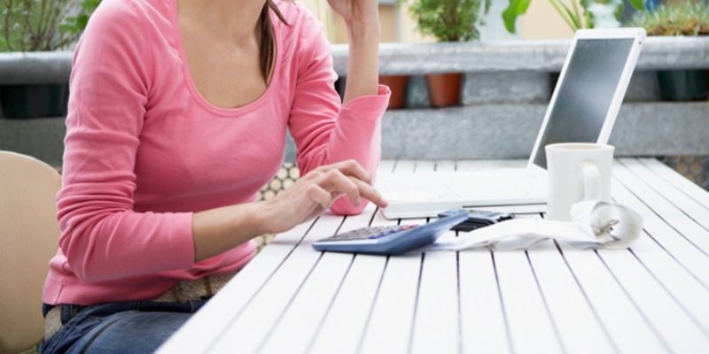 Why Start A Blog The Pros And Cons Of Blogging Header Image Of Female Blogger Using Laptop 1