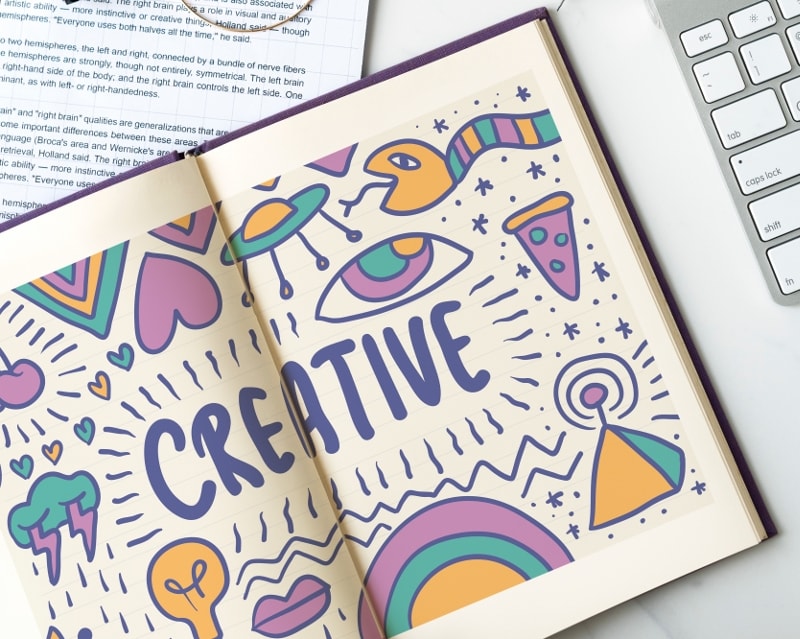 Creative Entrepreneur Notebook With Keyboard And Paperwork